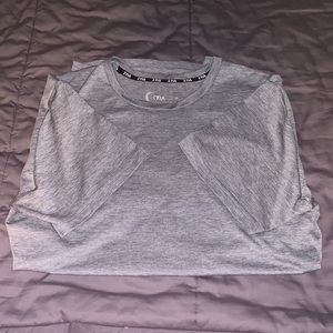 Grey ZYIA workout shirt.